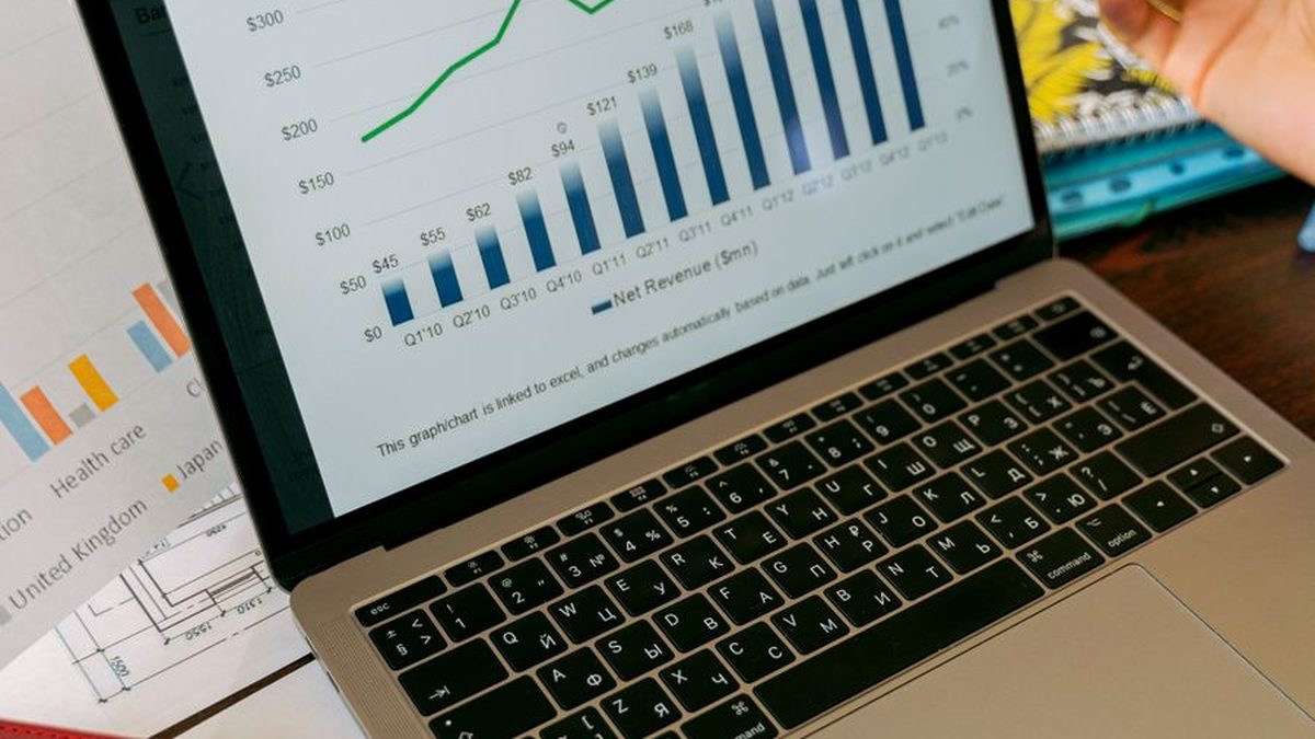 Team reviewing engagement analytics on a laptop